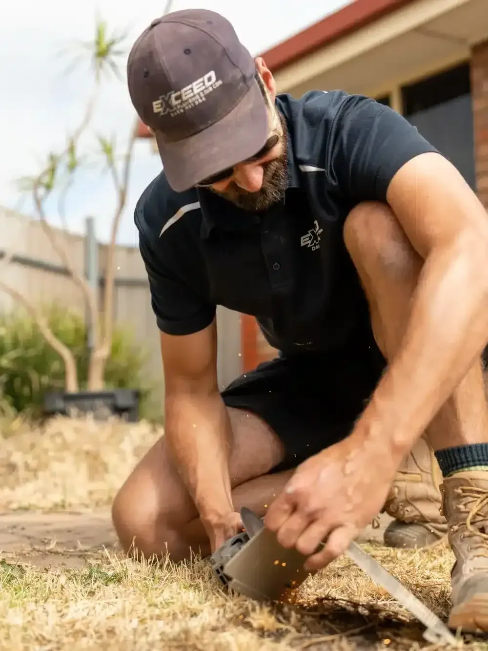 A Belair plumber at work on a job